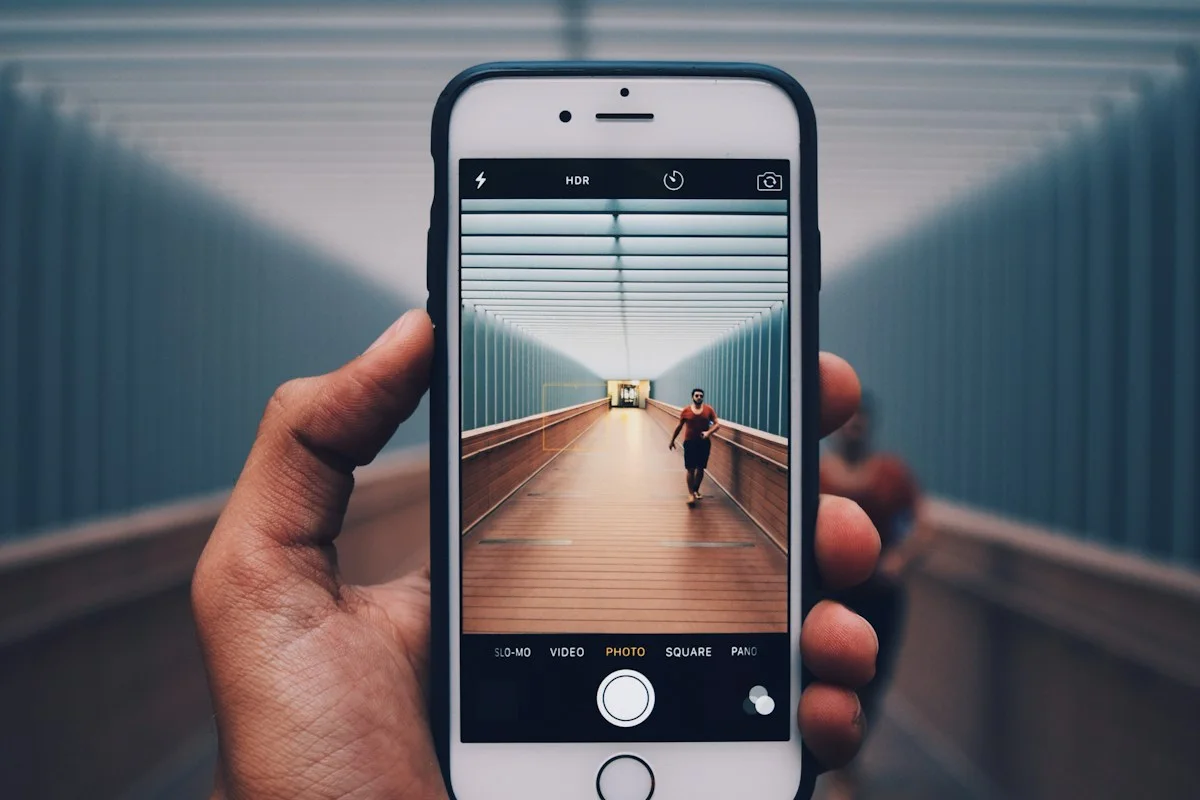 Taking a photograph with a phone outdoors