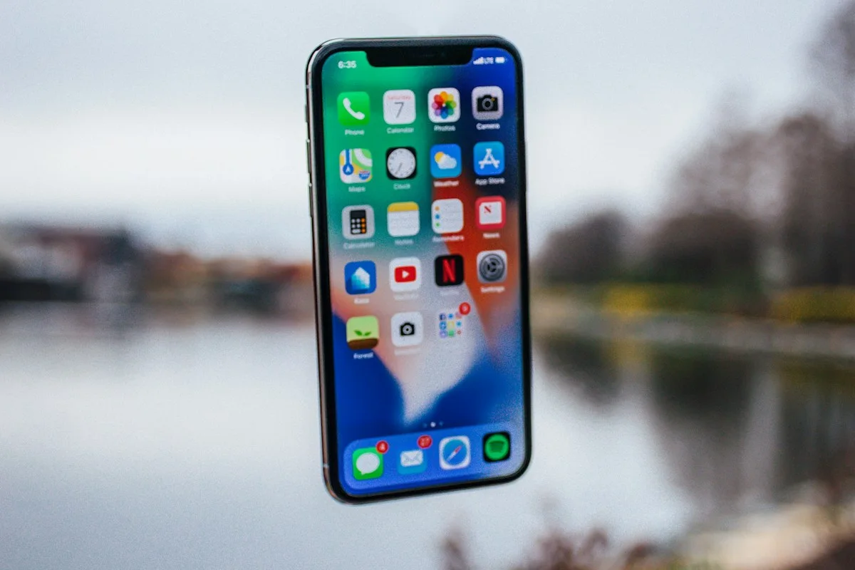 Smartphone beside a lake